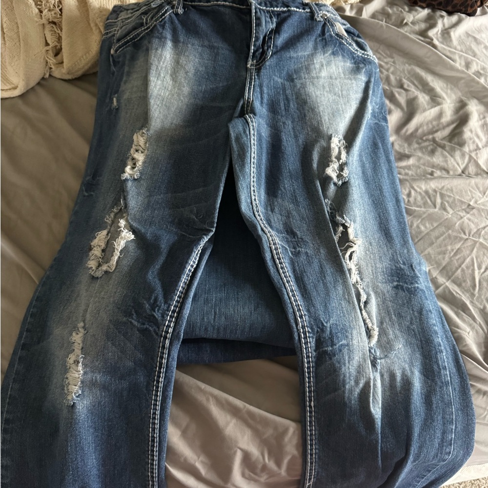 Vanity Denim Jeans with Distressed Details